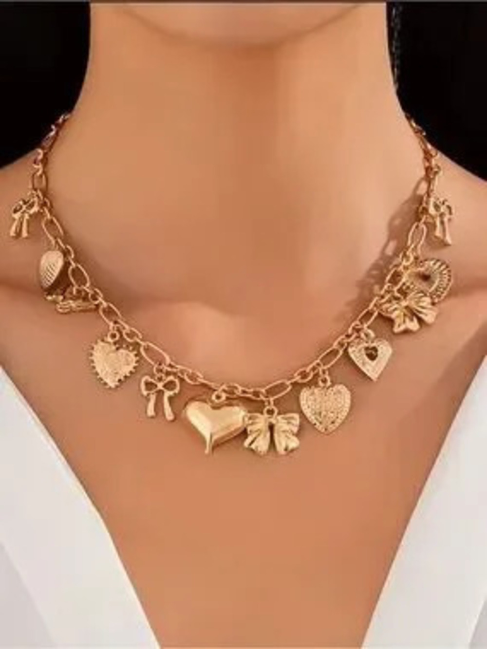 Anthropologie Gold Heart & Bow Charm Necklace